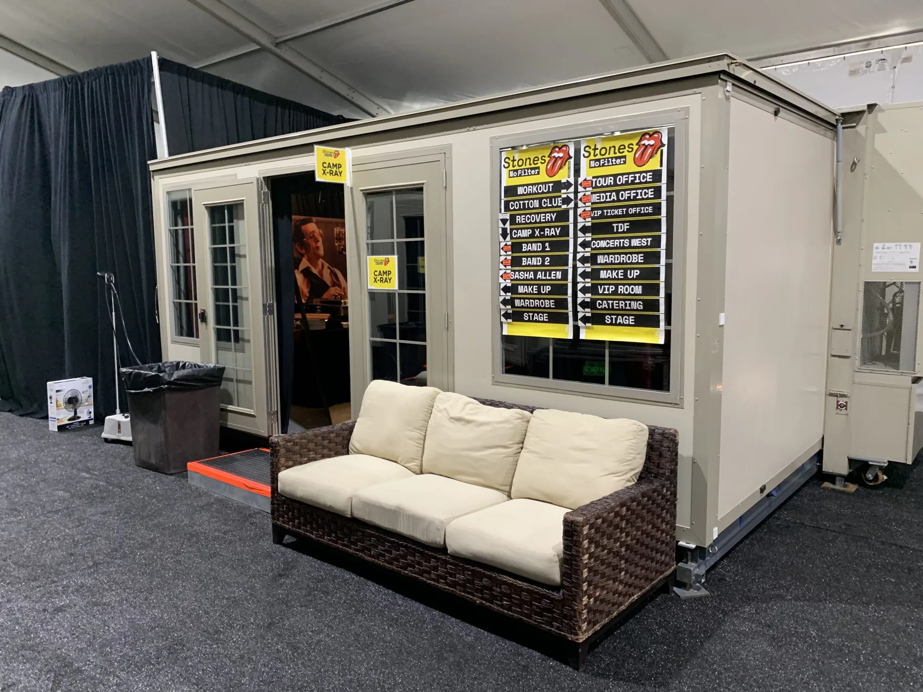 FORTS registration space with outdoor seating at a Rolling Stones event